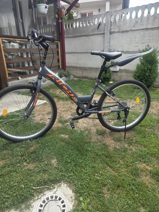Bicicleta, fără defecte .Trekking Rich roata de 24 inch 6 viteze.
