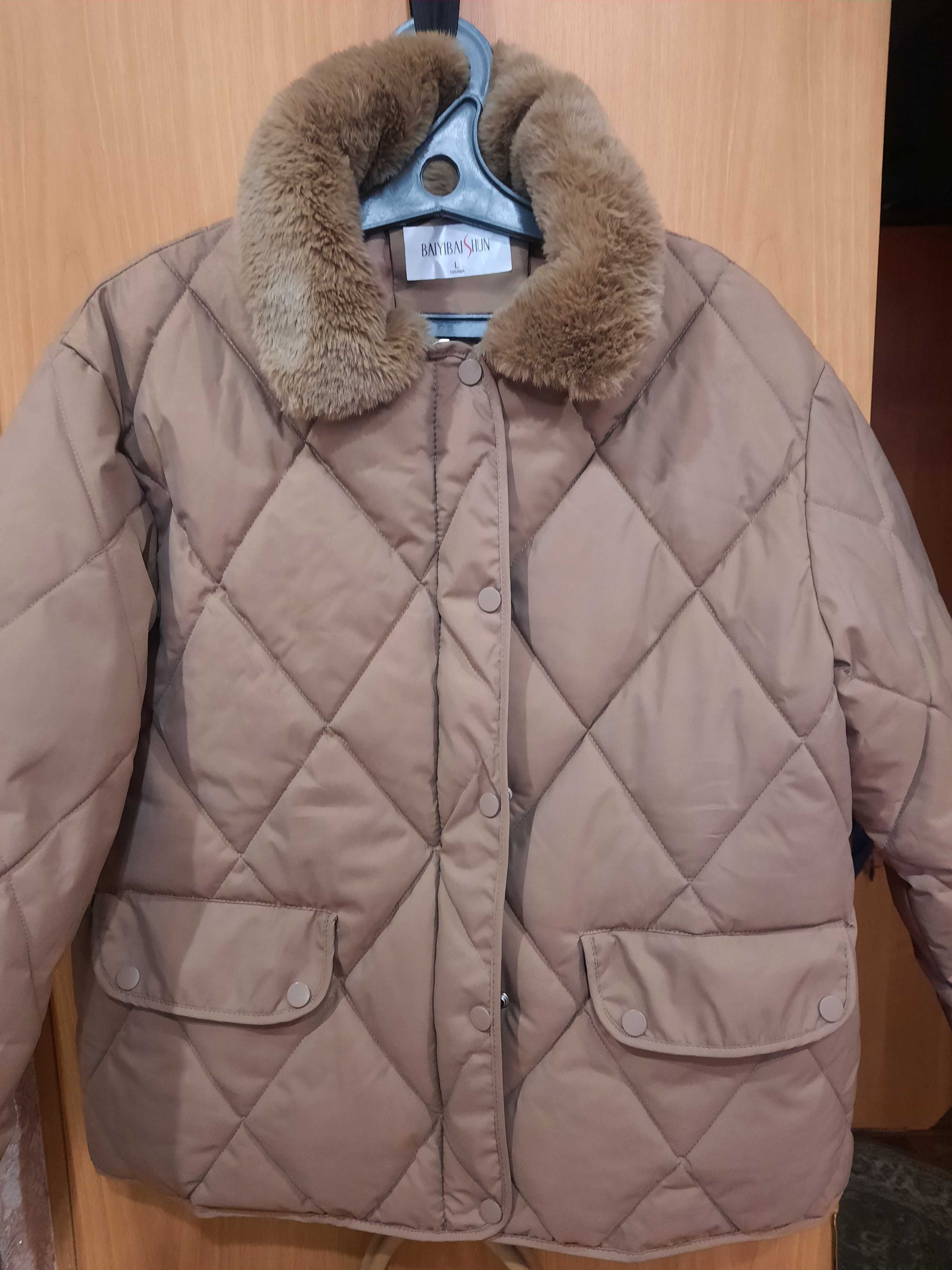 Продам женскую куртку