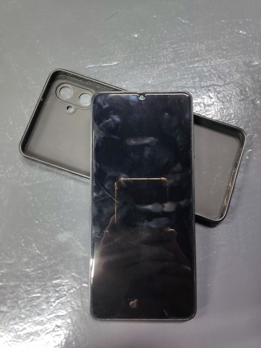 Телефон Samsung A06