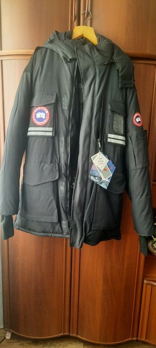 Пуховик мужской ,новый