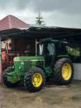 Vând john deere 3140