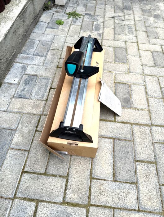 Ghilotina taiat parchet