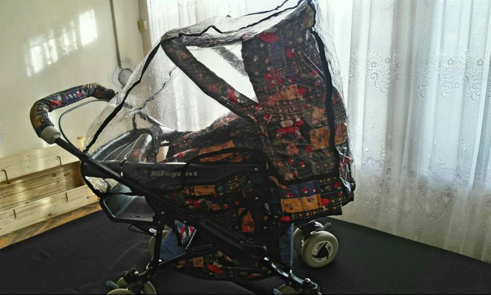 Детска количка с ветробран и чувалче за бебето