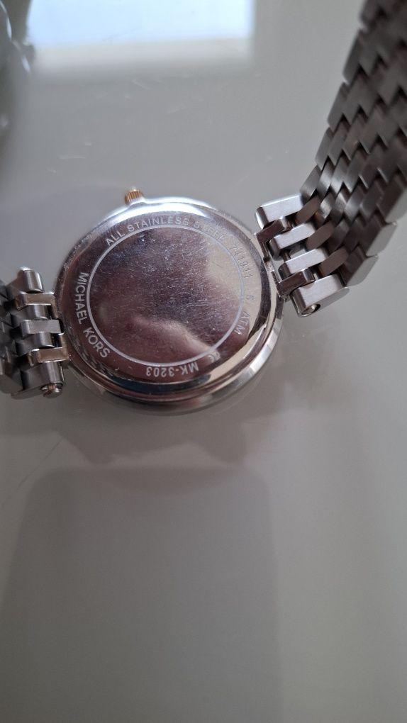 Calvin klein  , Michael kors