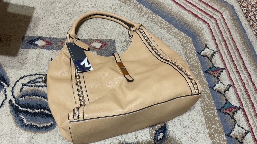 Женская сумка коженная