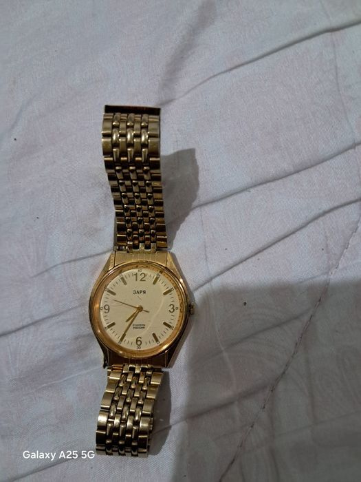 Часы россия заря