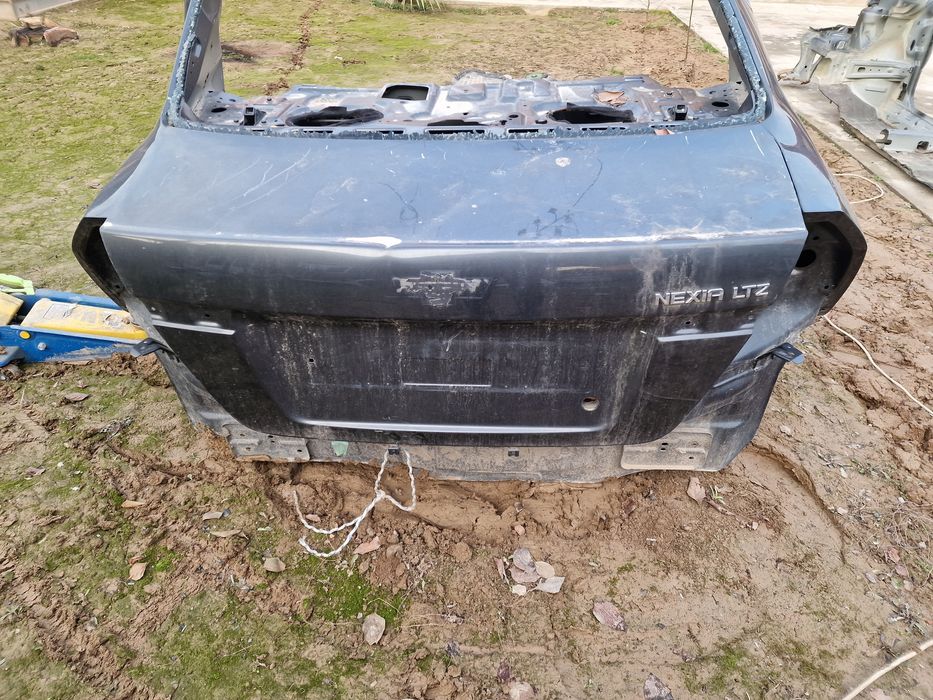 Нексия 3 орқа томони (задок]