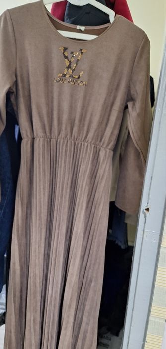 Ayollar ko'ylagi sotiladi kiyilmagan yangi