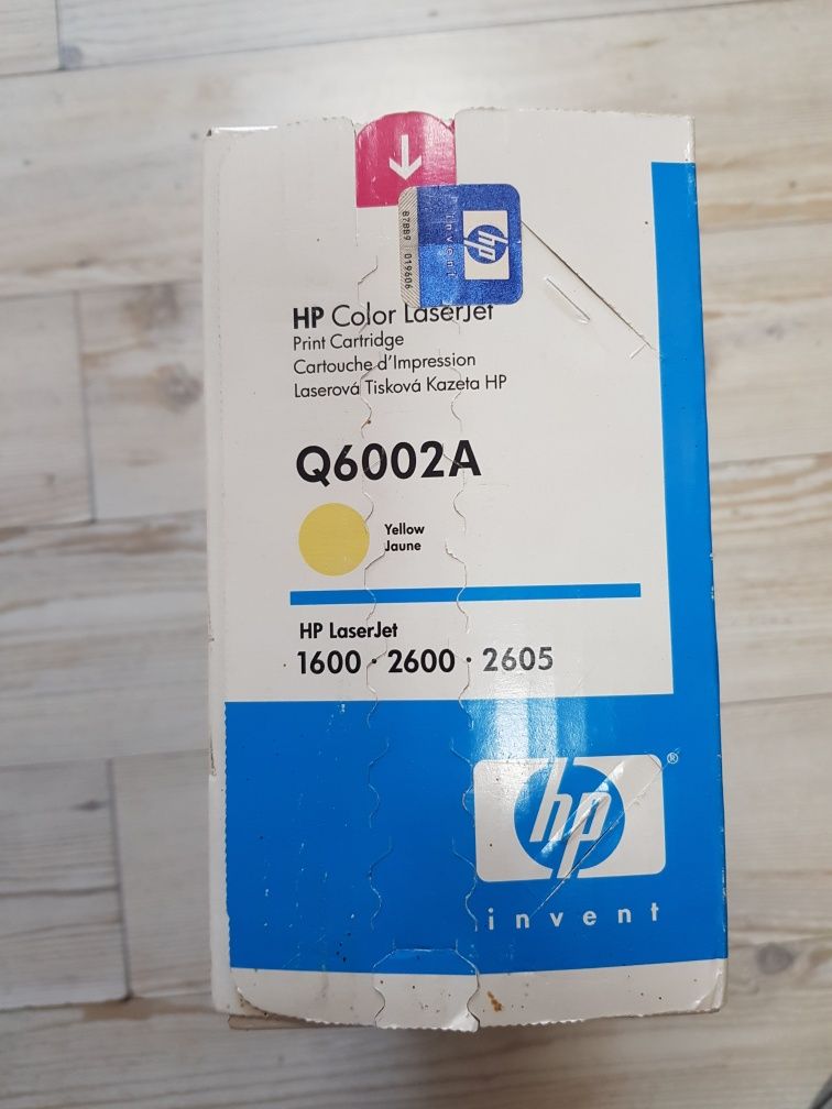 Залежала оригинална тонер касета HP 124A yellow