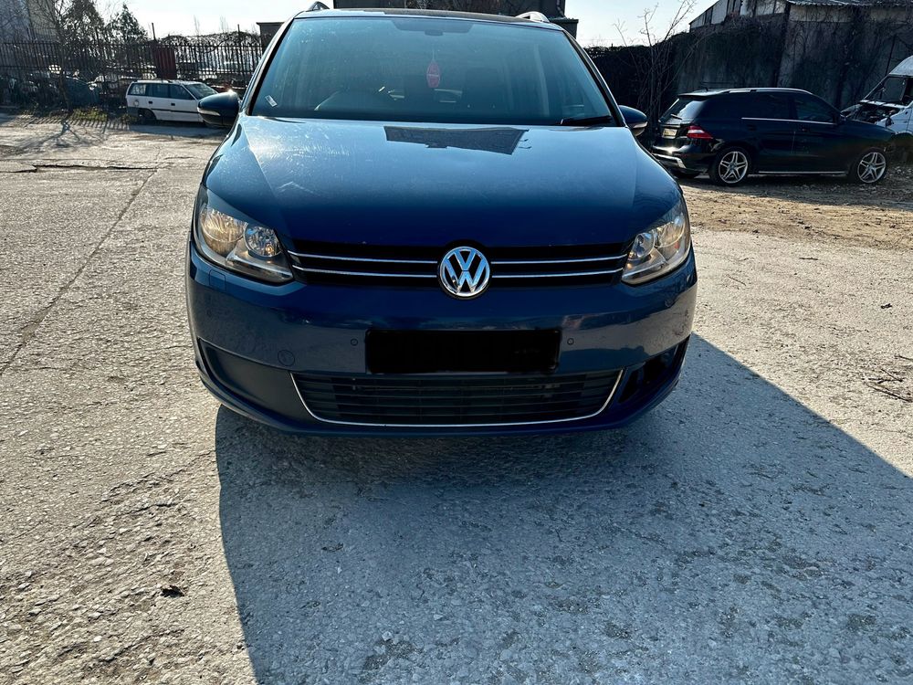 VW Touran 2.0TDI Bluemotion 2012г Фолксваген  Туран 140кс