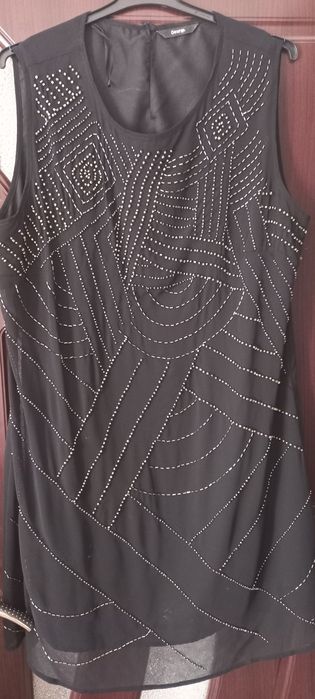 Vând rochite elegante masura 48