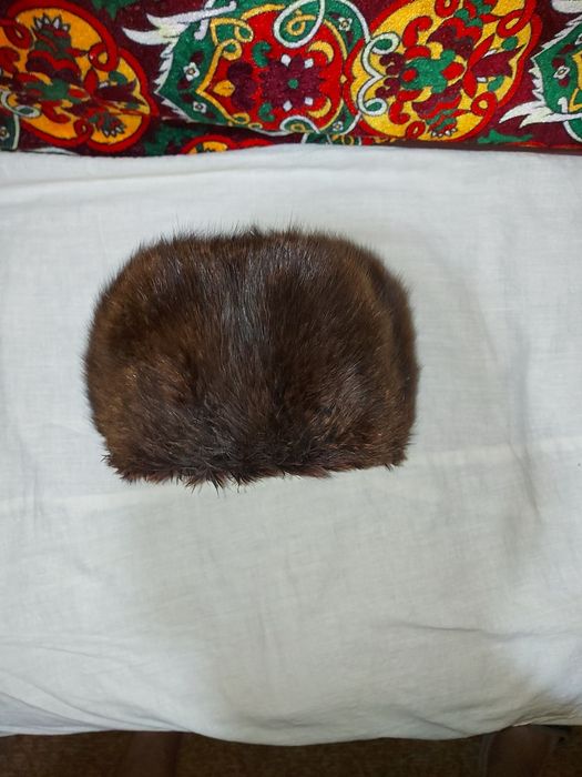 Порлдам   шапку  норкуваю  57  размер