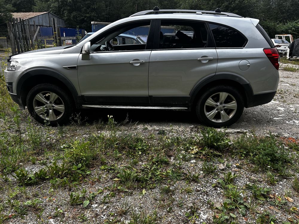 Dezmembrez chevrolet captiva 2.2 184 cp bara usi faruri compresor grup