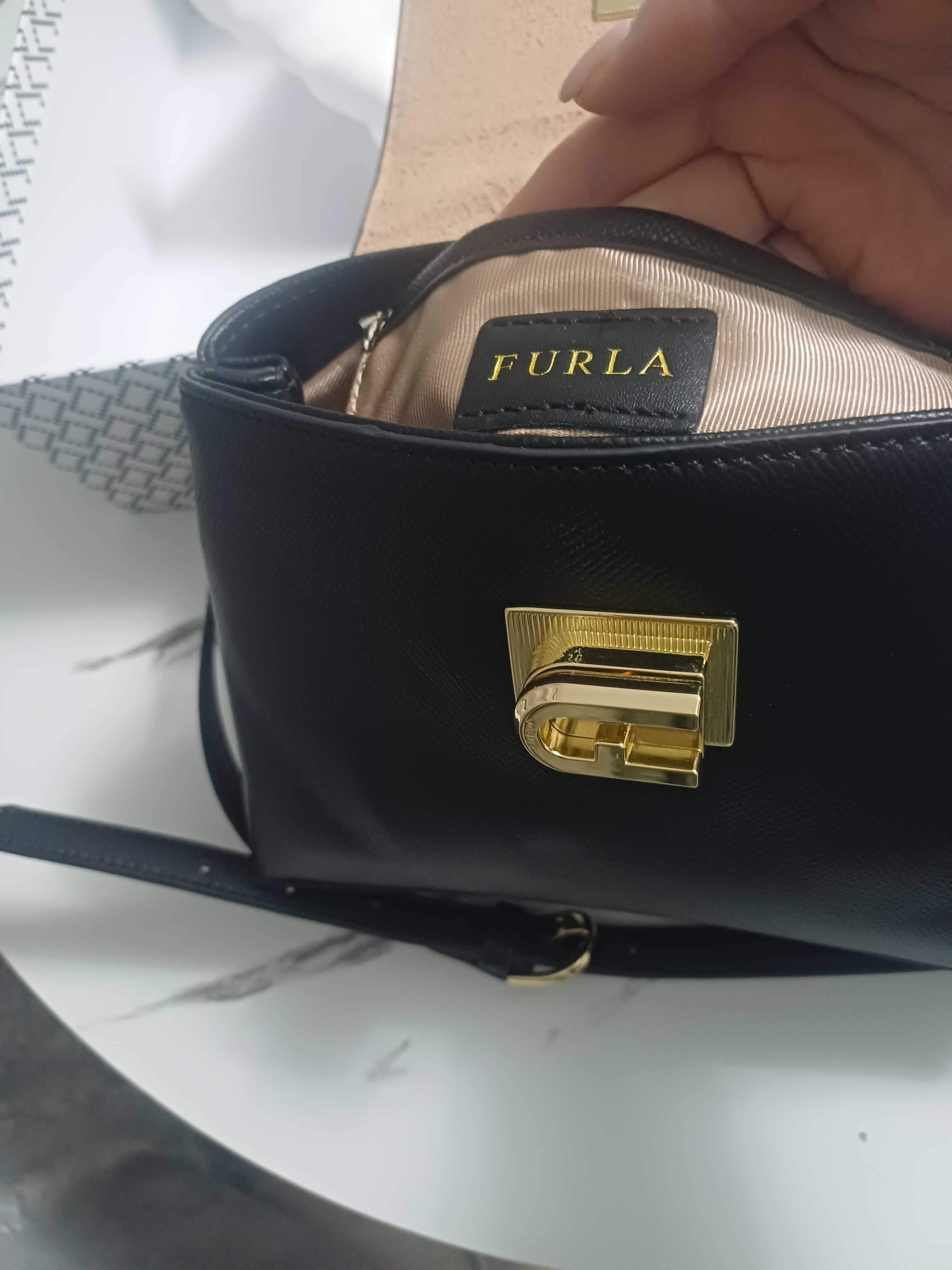Продам женскую сумку Furla