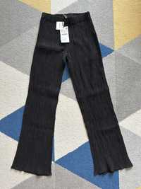 Pantaloni flare Zara