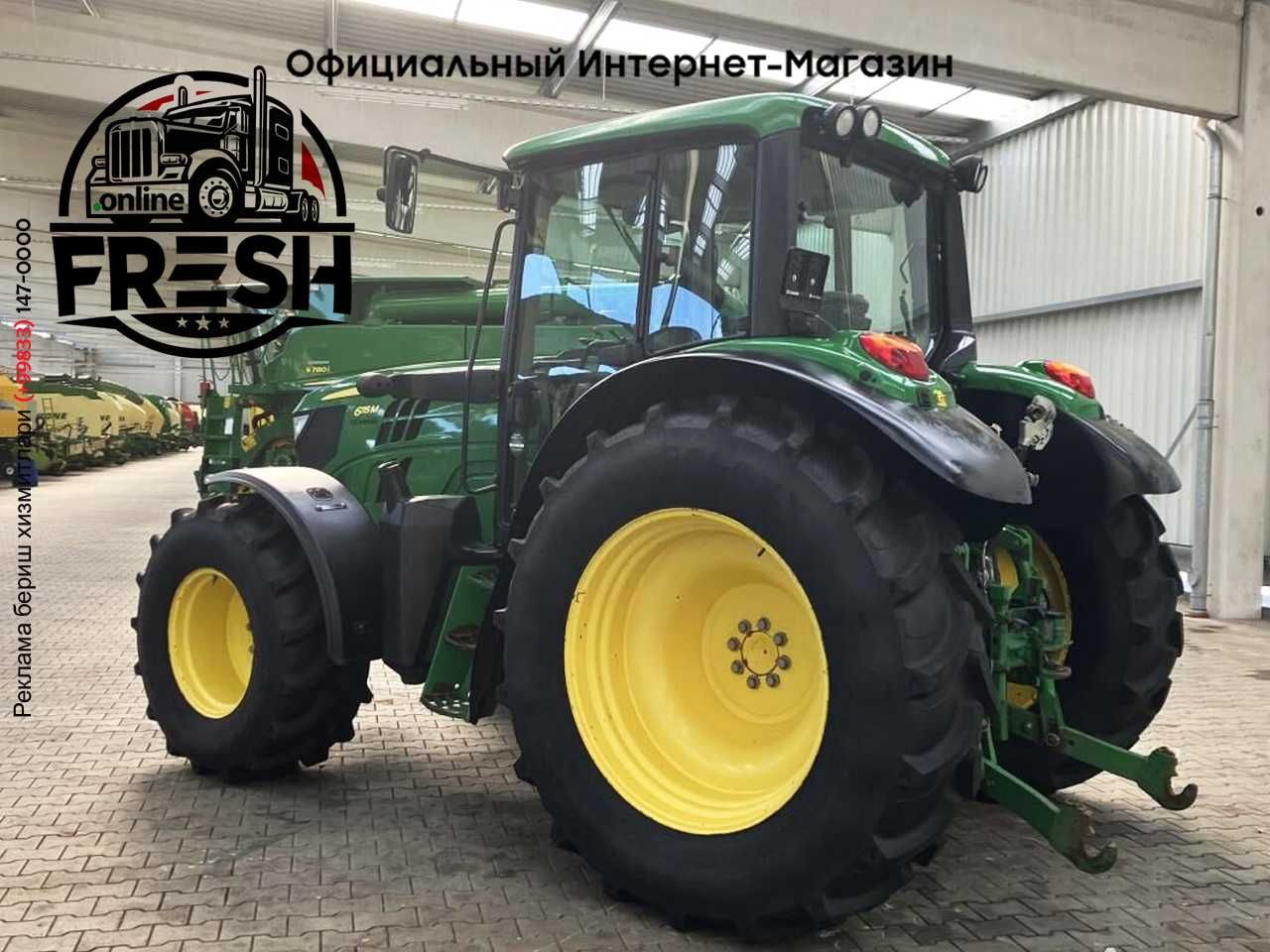 Колесный трактор John Deere 6115M