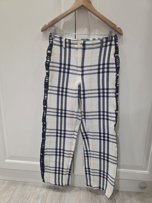 Женские брюки в черно-бело-жёлтую клетку от United Colors of Benetton
