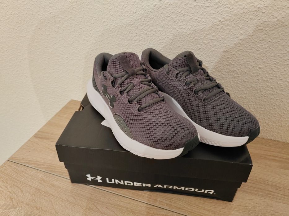 Under Armour model Charged Surge 4