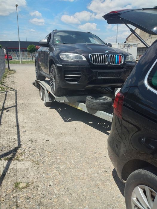 Tractari  auto cu platformă si 5 pers