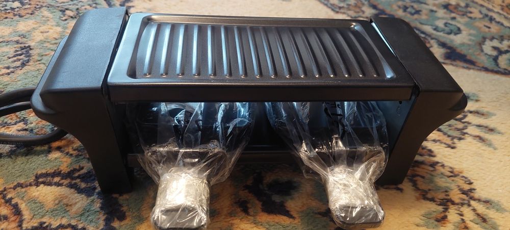 Продам  многофункциональный электрогриль.