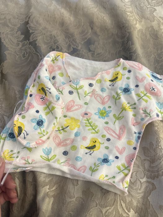 Продам еше есть одежа новая мы родилсь ростом 60