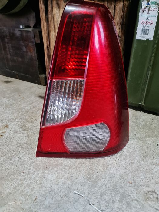 Faruri logan originale Elba (faza 1 ) și lampă spate