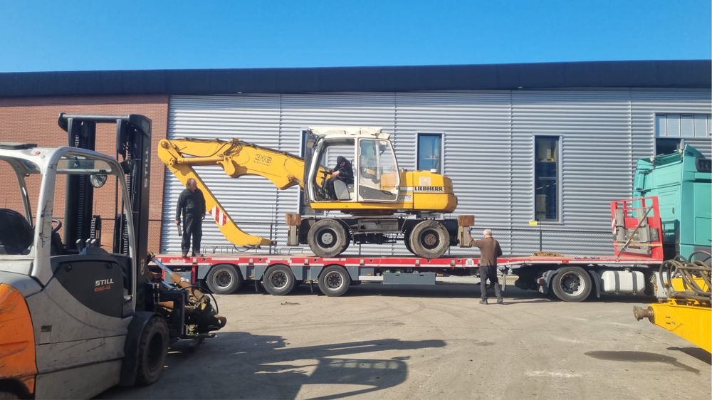Excavator pe pneuri Liebherr A316 cu graifer – Leasing disponibil