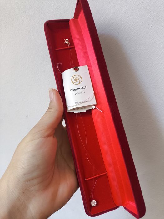 Золотая подвеска на леске