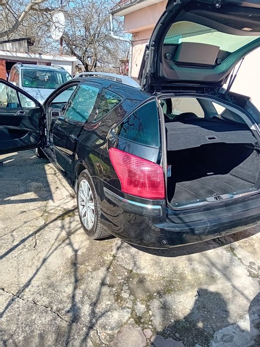 Vand peugeot 407..