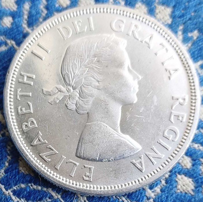 Серебряная монета 1 доллар Канады 1964 года