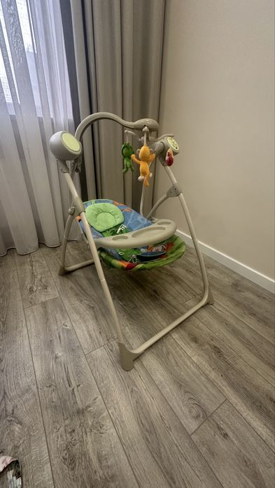 Детские качели автоматические