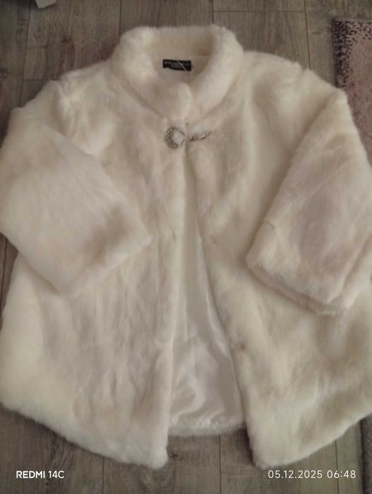 Чисто ново палто