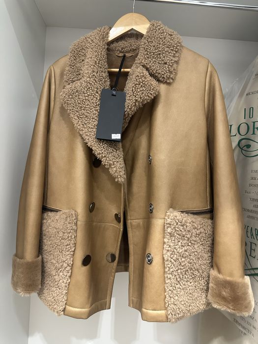 Новая женская дубленка