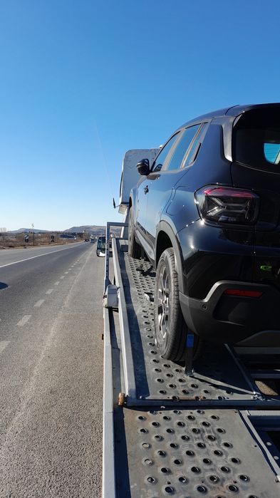 Transport auto pe platforma