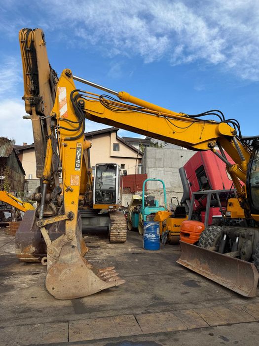 Excavator pe roti JCB JS145