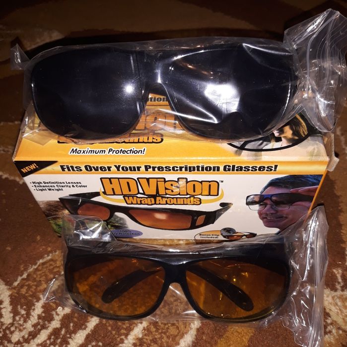 Vând  ochelari HD Vision de condus pe timp de noapte si timp de zi