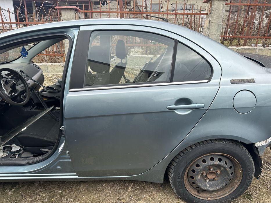 Задна лява врата за Митсубиши Лансър седан 2008-