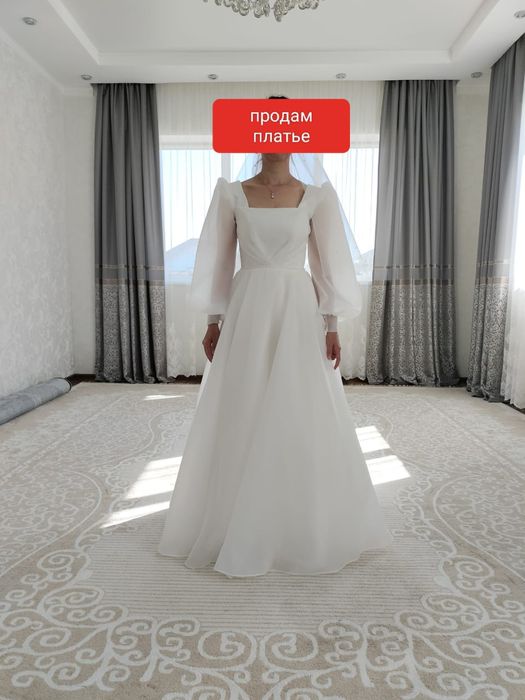 Продам свадебный платья