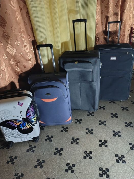 Genți de voiaj și trolere