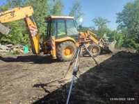 Buldoexcavator excavator laser dubla pantacamion pământ negru foreza v