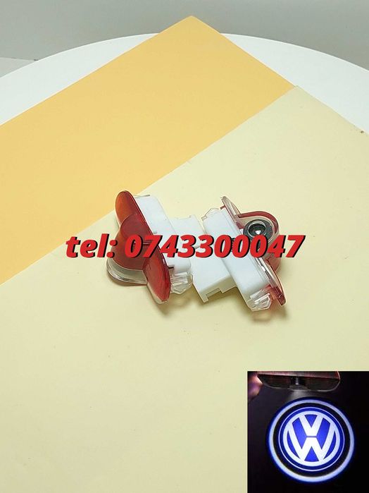Set 2 Proiectoare Cu Logo Portiere Vw Golf Iv Caddy Touran Bora