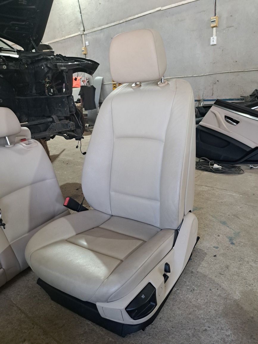 Interior piele crem incalzit bmw f11 seria 5 scaune si banchete