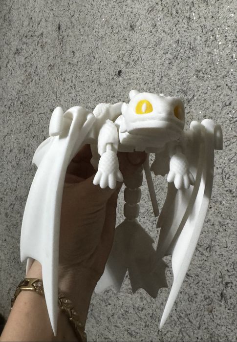 Подвижная игрушка дракон