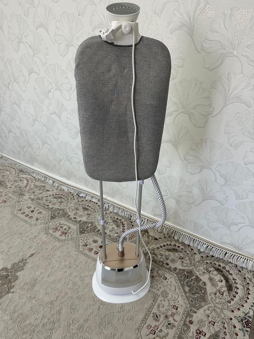 Паровой утюг.