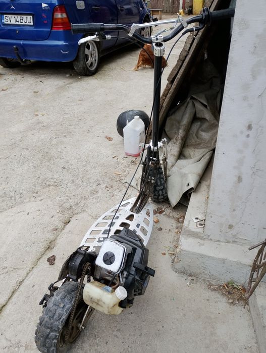 Vând trotineta Uber Scott 70x 71cc