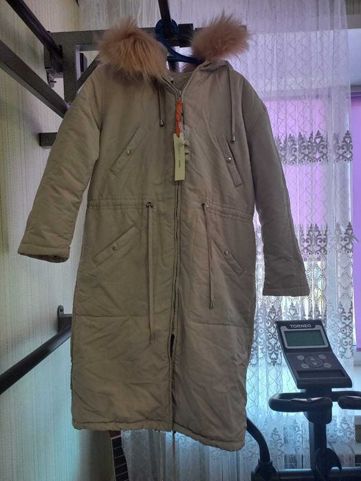 Продам новый женский пуховик