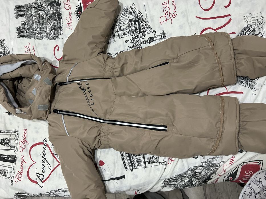 Продам новый комбинезон трансформер