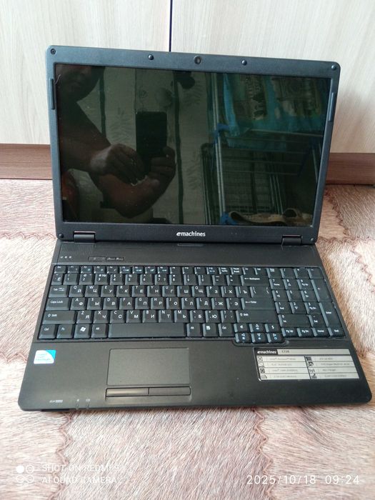 Ноутбук e machine 728