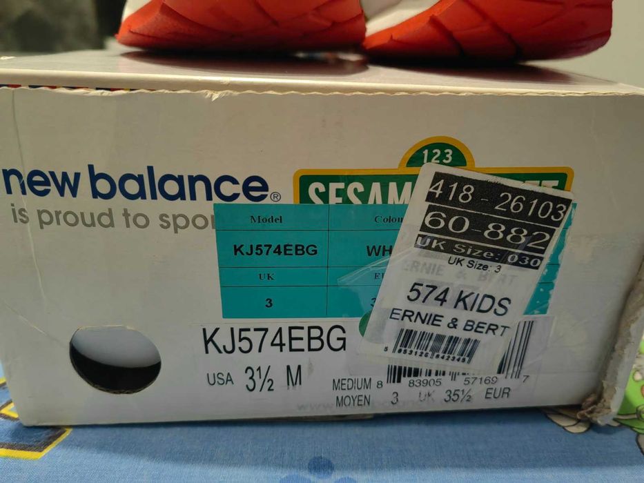 Маратонки New Balance улица Сезам