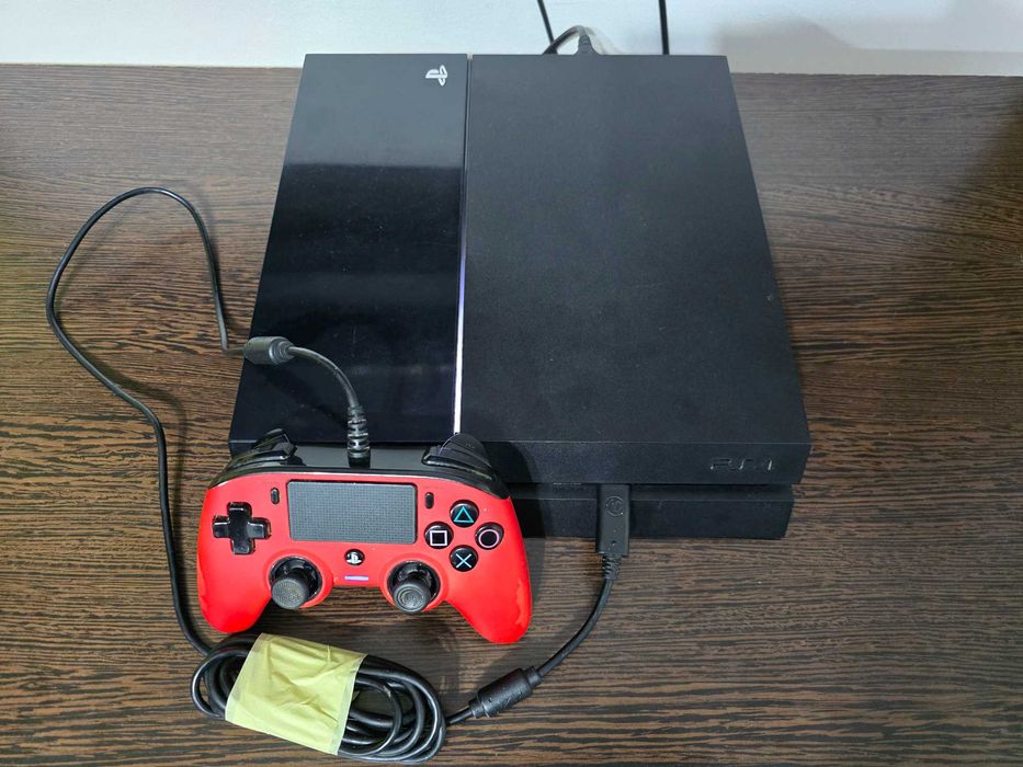PS4 cu jocuri si accesorii